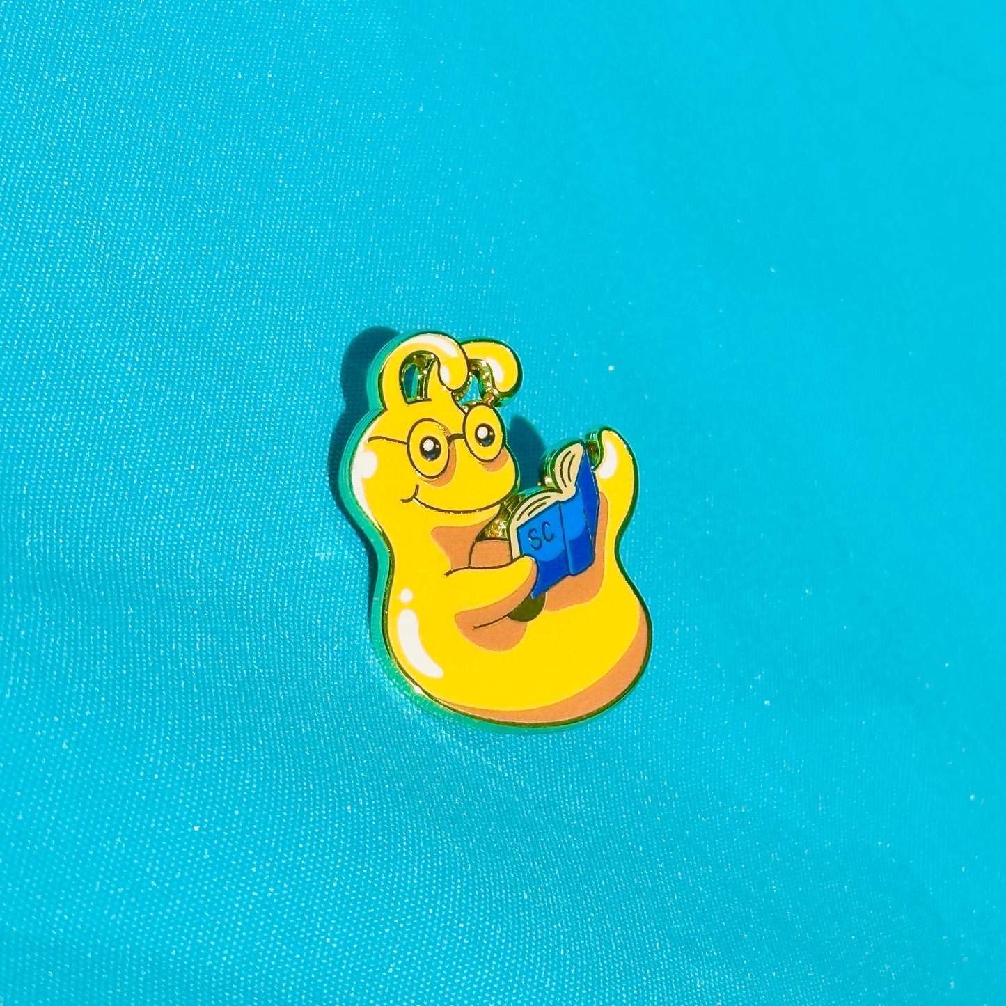 Yellow Slug Bookworm based on UC Santa Cruz Pin