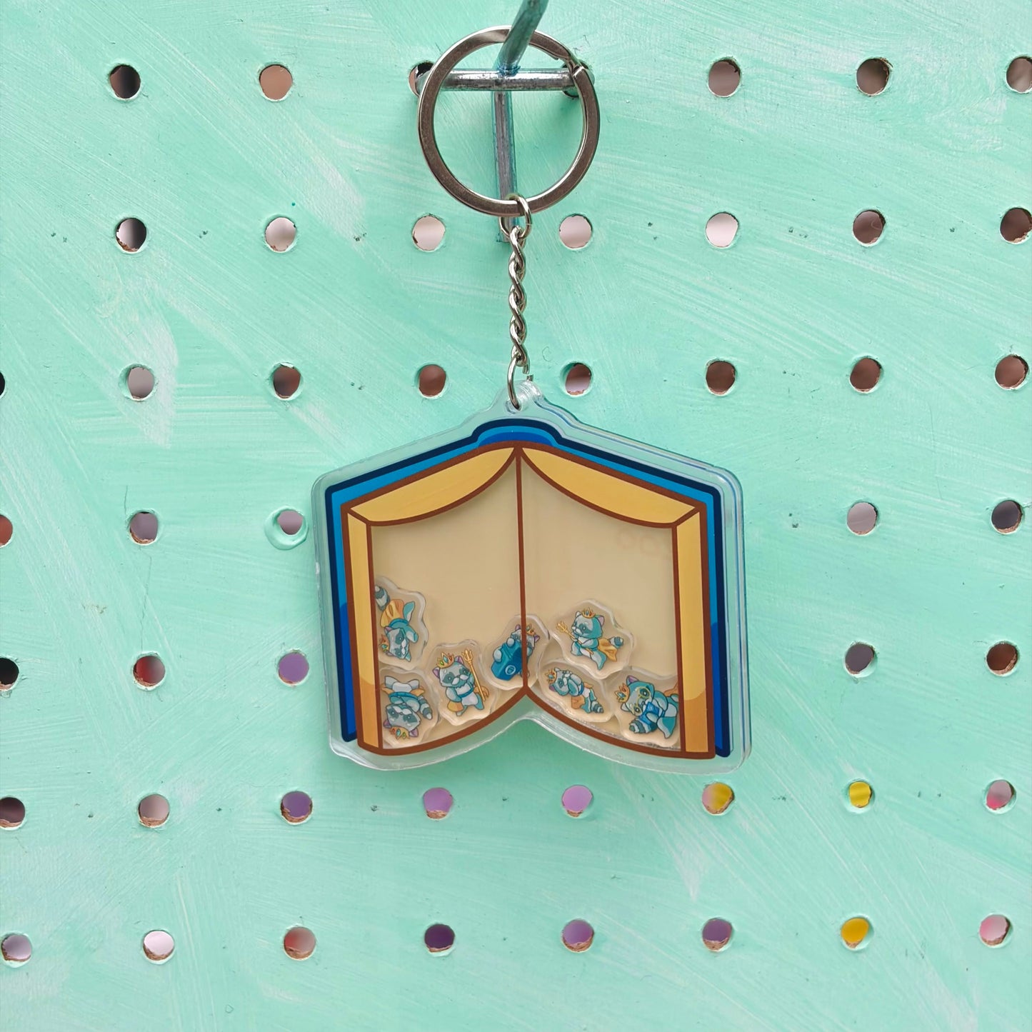 Book and King Raccoons Shaker (UCSD)