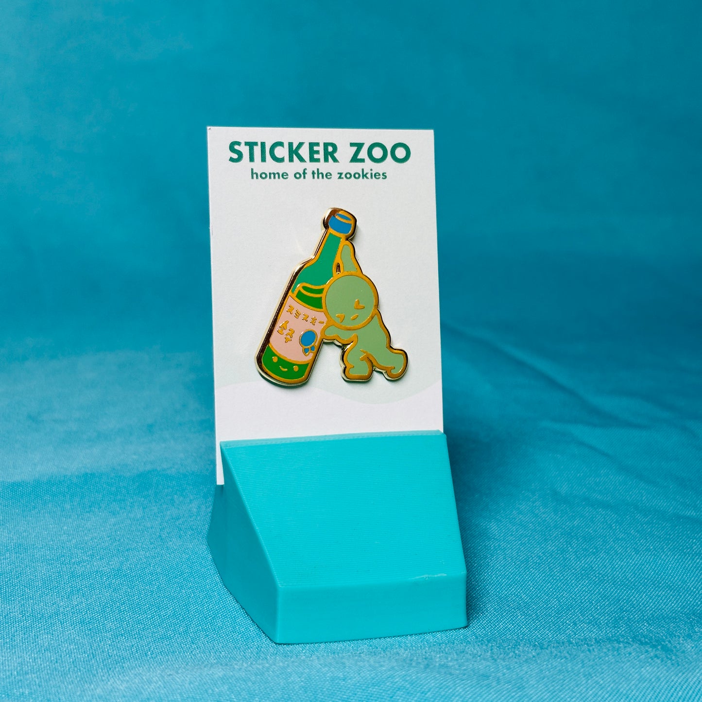 Green Guy Pushing Soju Pin