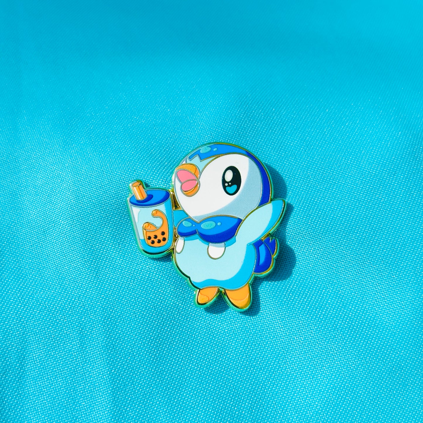 Blue Penguin with Thai Tea Pin