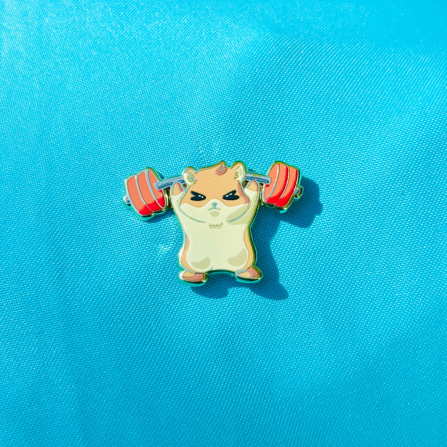 Hemmy the Hamster Lifting Weights Pin