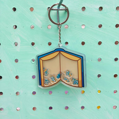 Book and King Raccoons Shaker (UCSD)