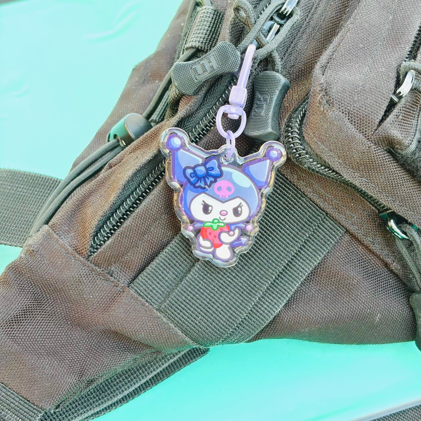 Cute Purple Cat Holding Strawberry Keychain